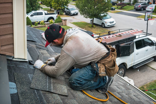 Professional Roofing technician working in Lindsay, CA